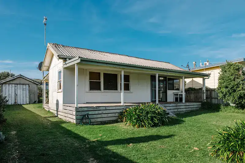 Old rundown Bay Shore home listed for a fast cash sale